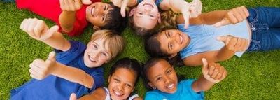 Happy Children on Ground — School & Sport Physicals in Waterboro, ME.