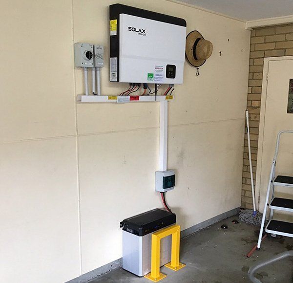 Solax Solar Inverter Installed in Garage — Solar Panels in Taree, NSW