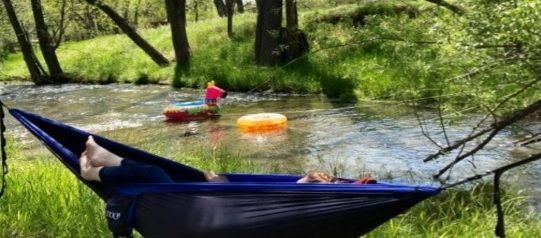 Girl floating in river