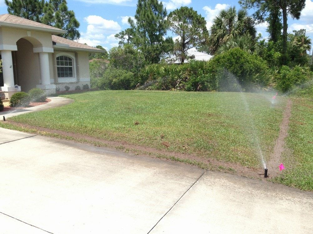 Lawn With Sprinklers — Port Charlotte, FL  — American Irrigation