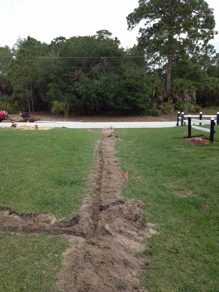 Empty Lawn With Dug Hole — Port Charlotte, FL  — American Irrigation