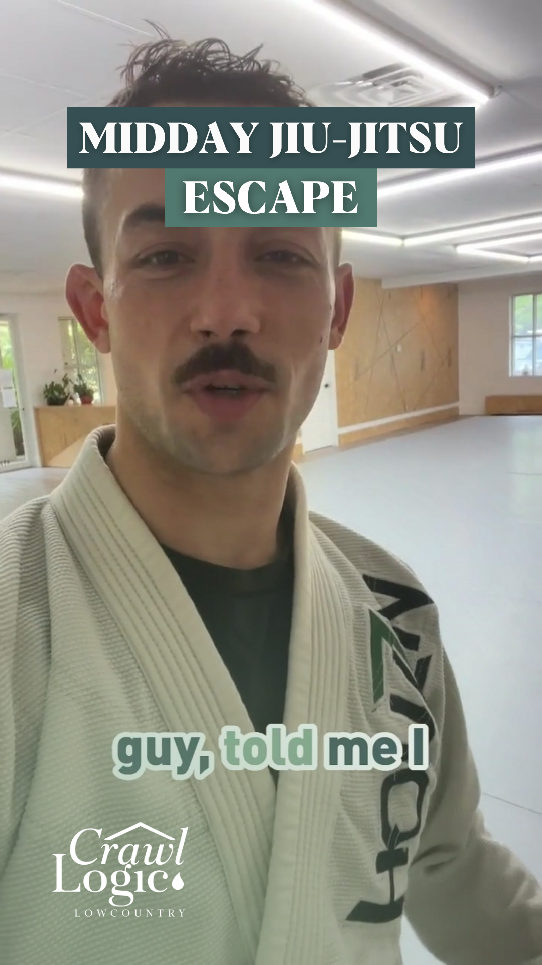 A man in a karate uniform is standing in a gym.
