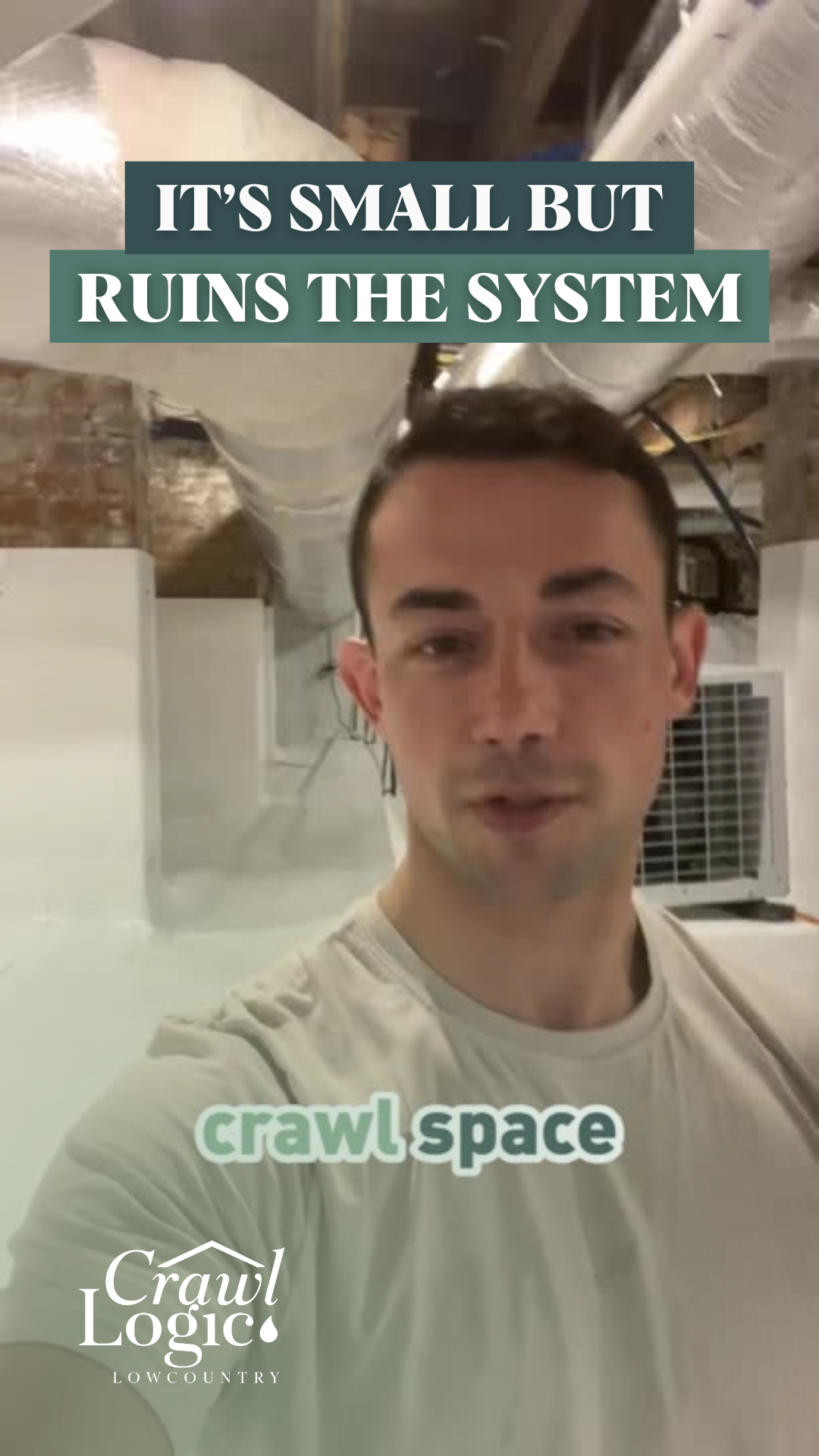 A man is taking a selfie in a basement.