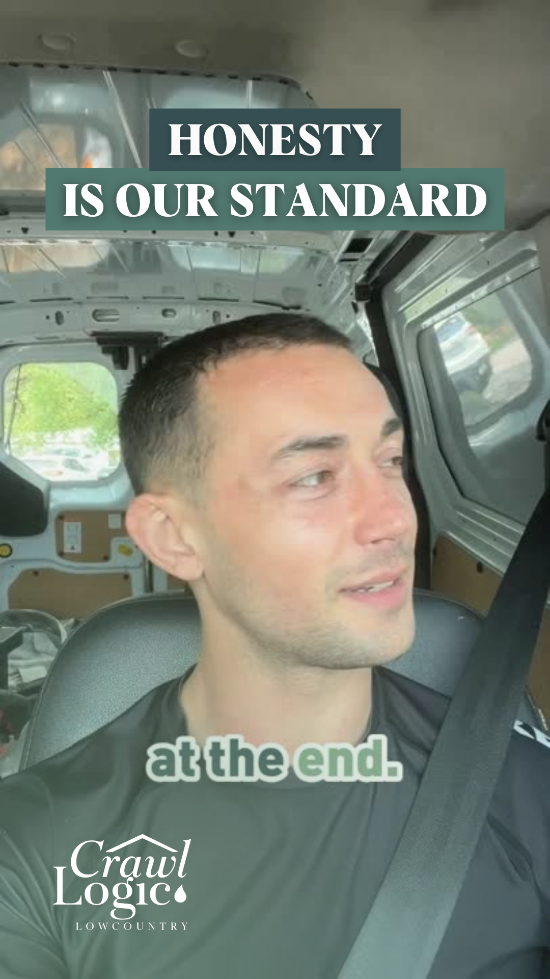 A man is sitting in the back seat of a van.