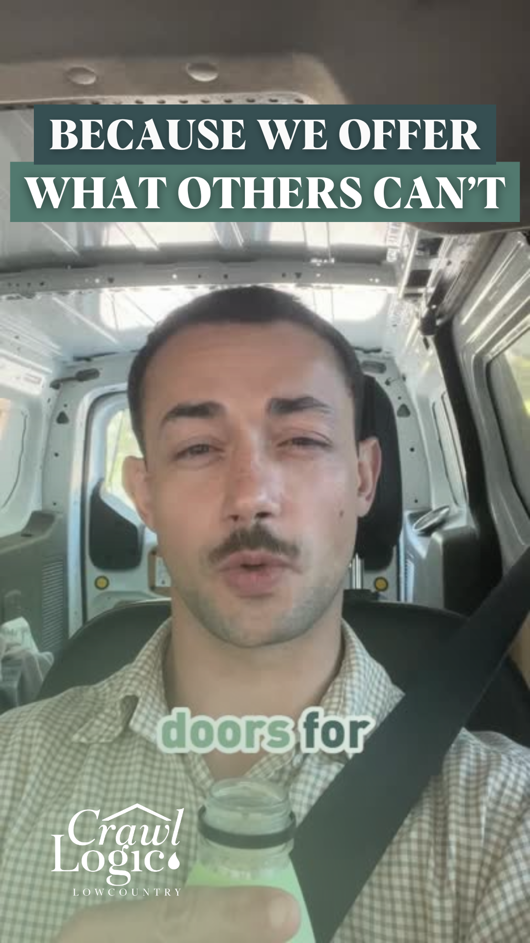 A man with a mustache is sitting in a car holding a bottle of water.