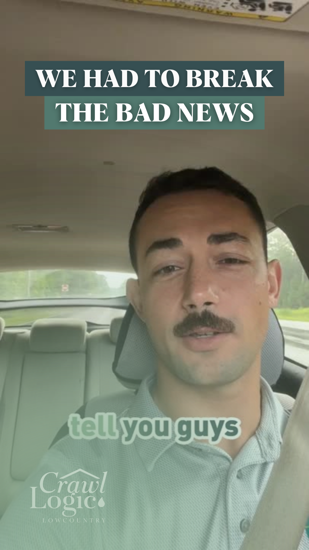 A man with a mustache is sitting in the back seat of a car.