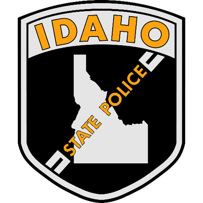 A badge for the idaho state police with a map of the state