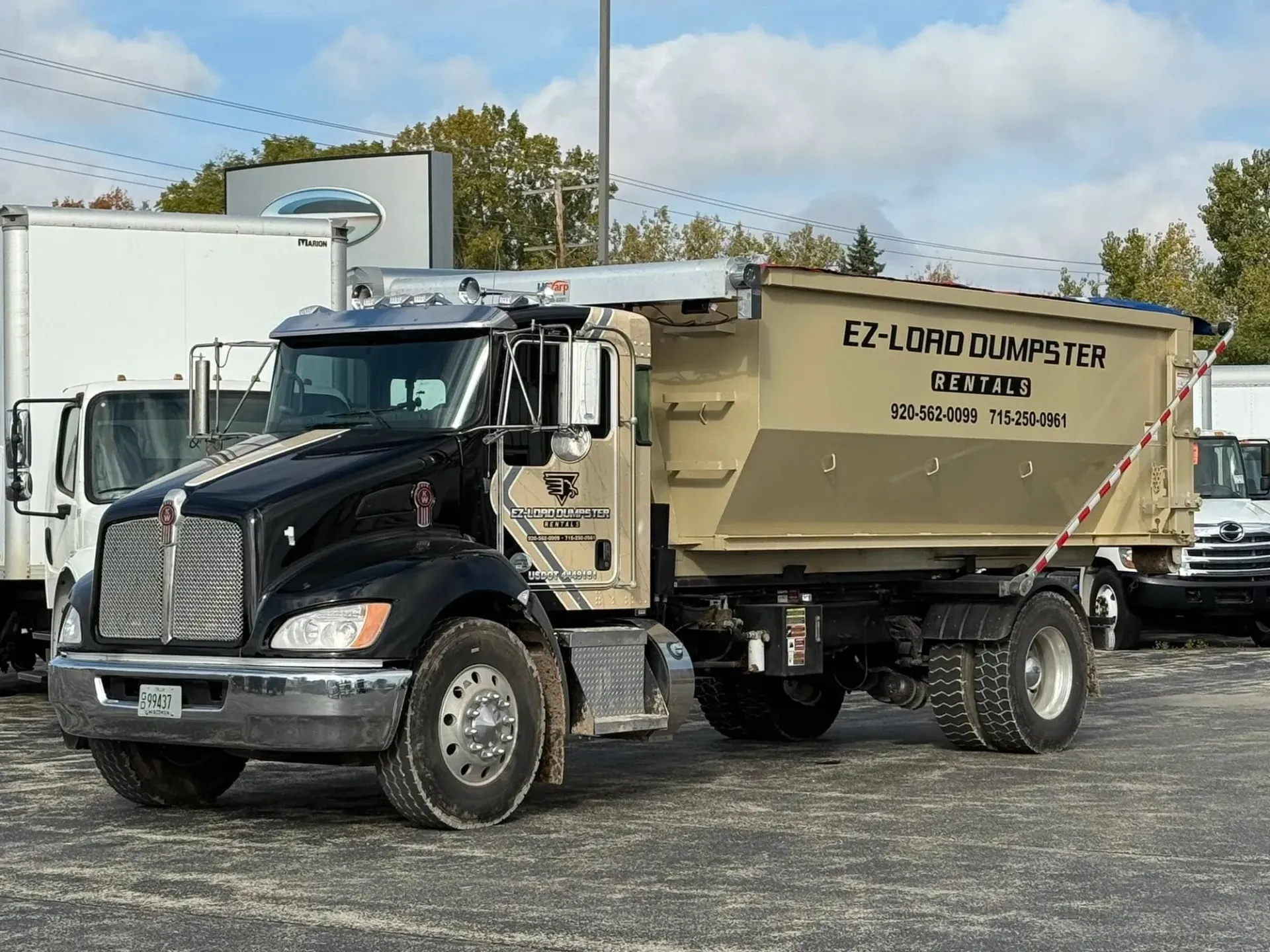 EZ-Load Dumpster Rentals roll-off dumpster on job site