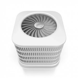 A white air conditioner with a fan on top of it on a white background.