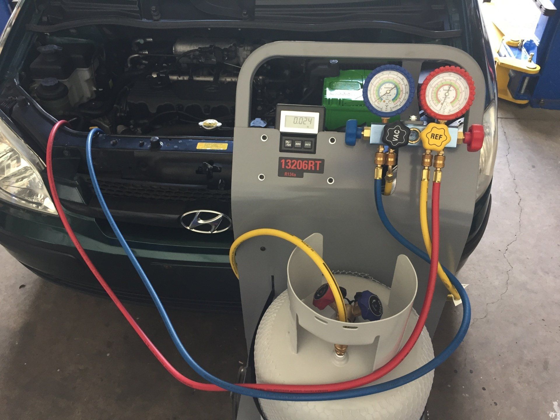 Car Air Conditioning Station For Diagnostic Of Freon — Automotive Mechanical Repairs in Caloundra West, QLD