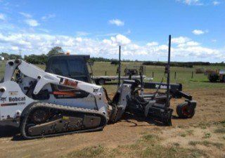 Yellow bobcat truck — Tipper Hire & Construction in Bundaberg, QLD