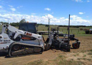 Yellow bobcat truck — Tipper Hire & Construction in Bundaberg, QLD Yellow bobcat truck — Tipper Hire & Construction in Bundaberg, QLD
