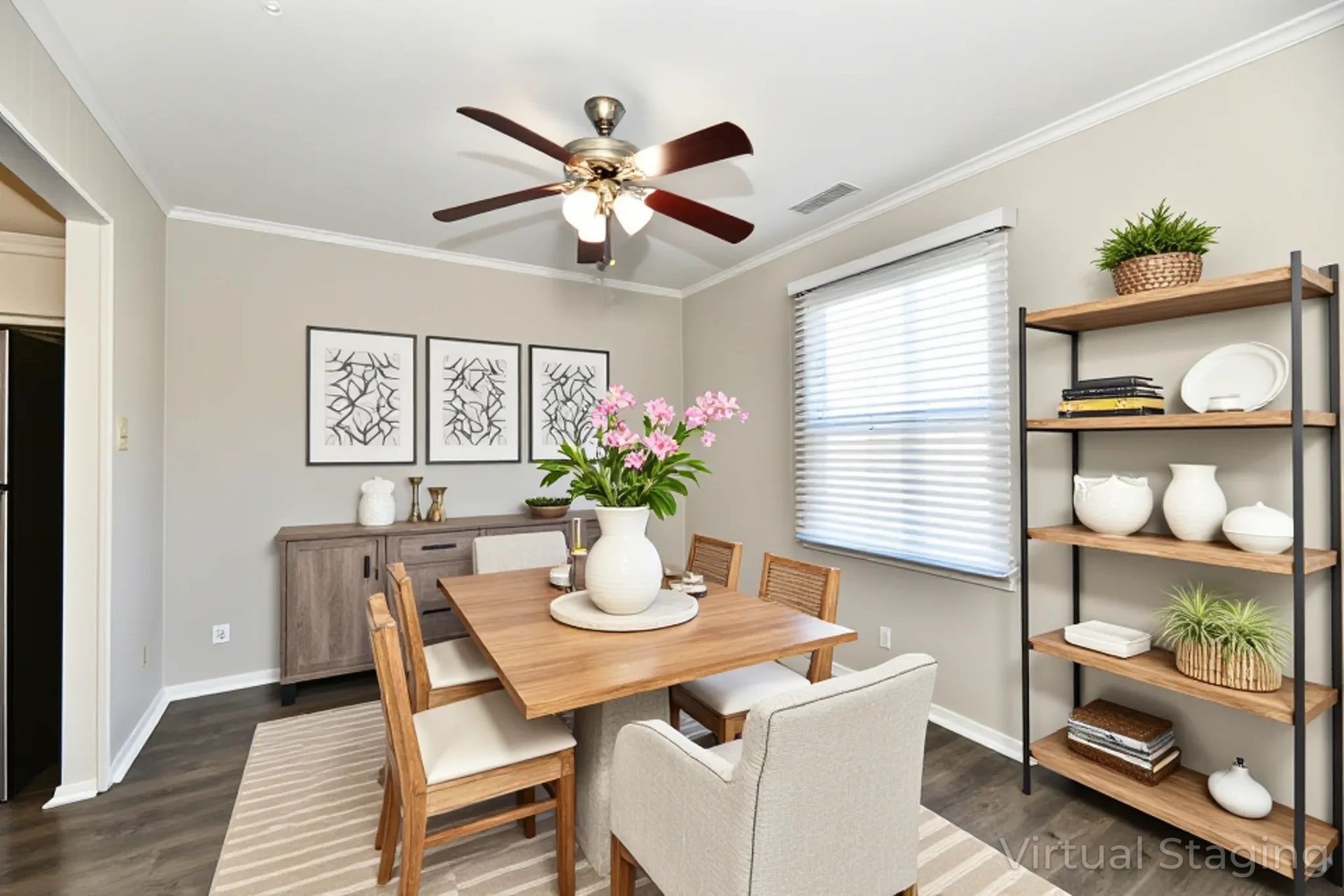 An empty dining room with hardwood floors and a sliding glass door.