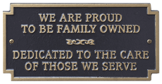A sign that says we are proud to be family owned dedicated to the care of those we serve