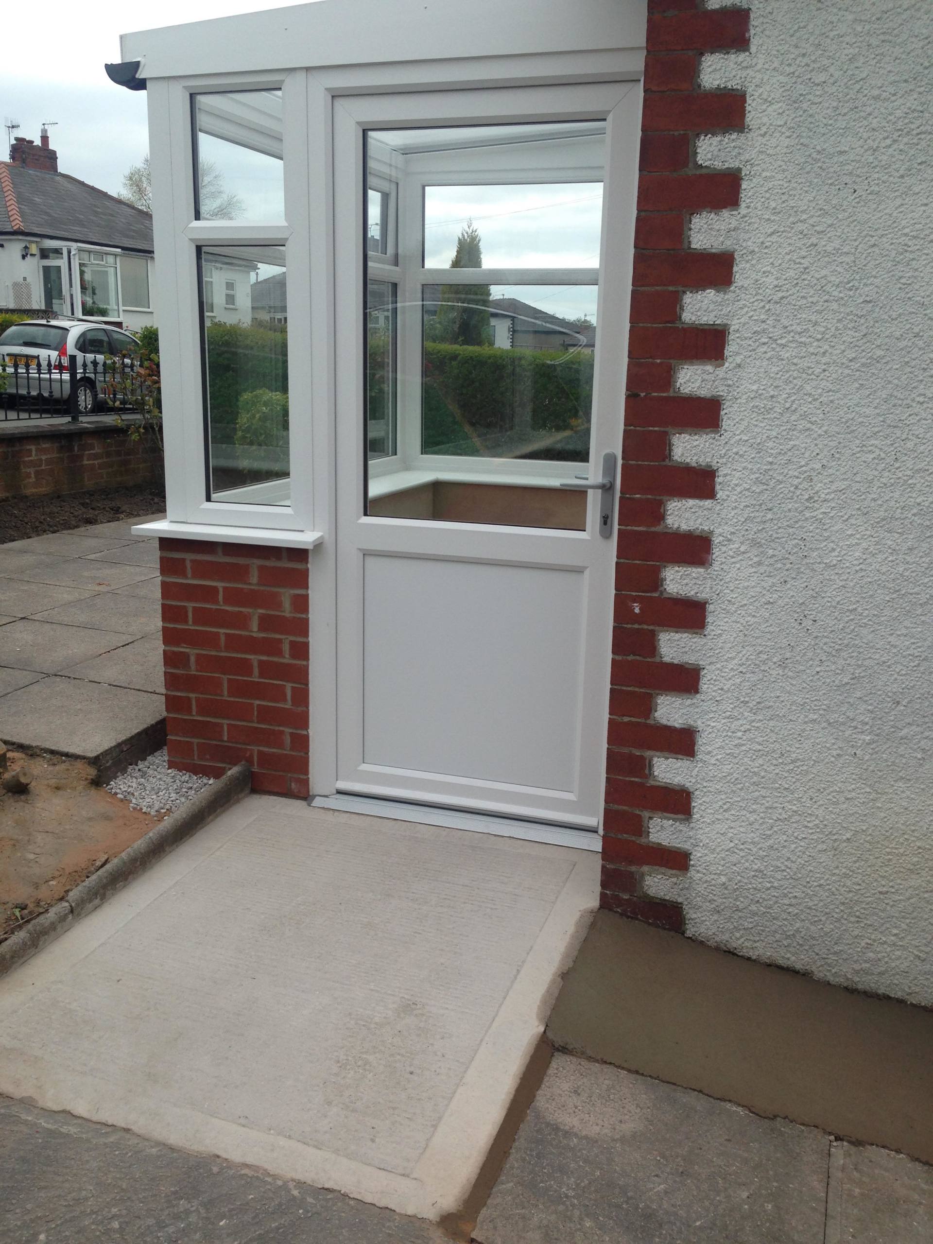 newly constructed house extension with white doors