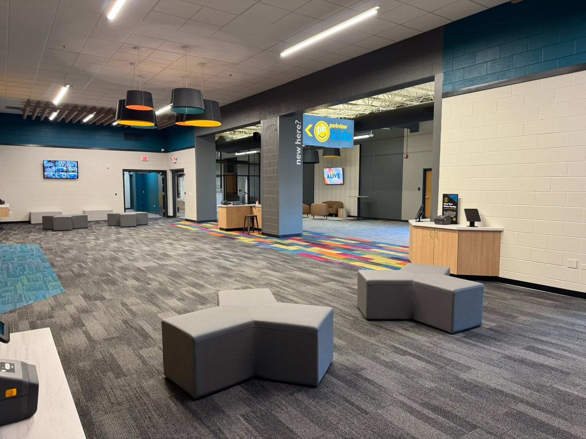 A large room with a lot of furniture in it.