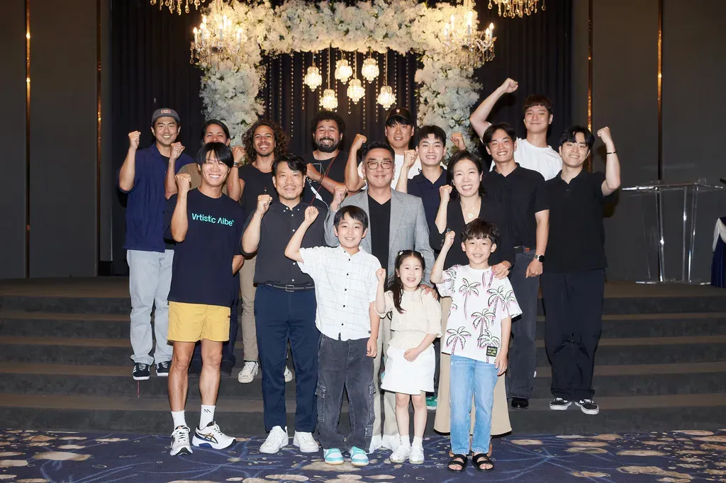 A group of people are posing for a picture in a room.