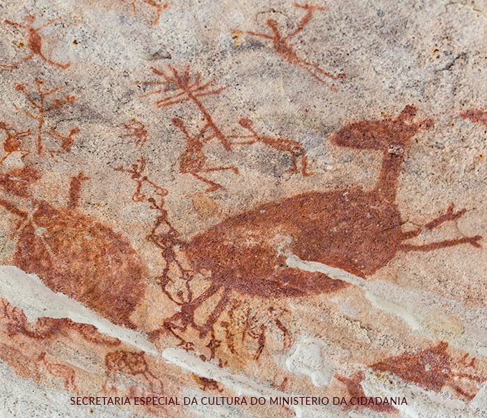 There is a painting of a deer on the wall.