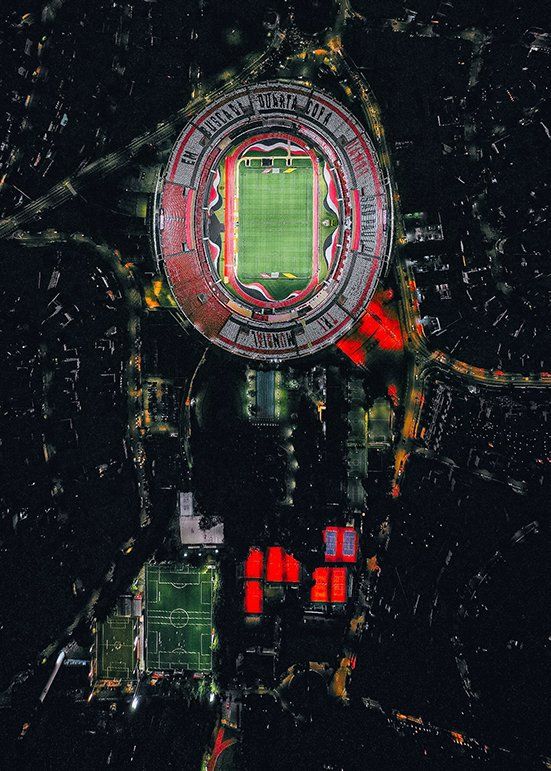 An aerial view of a soccer stadium at night