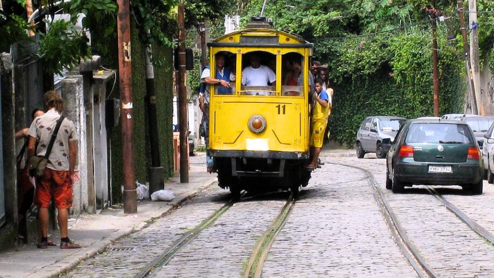 A yellow trolley with the number 11 on it