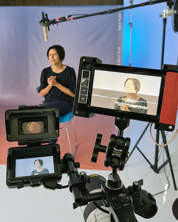 Andrea Noreña vicepresident of Google Latin America sits in front of a camera