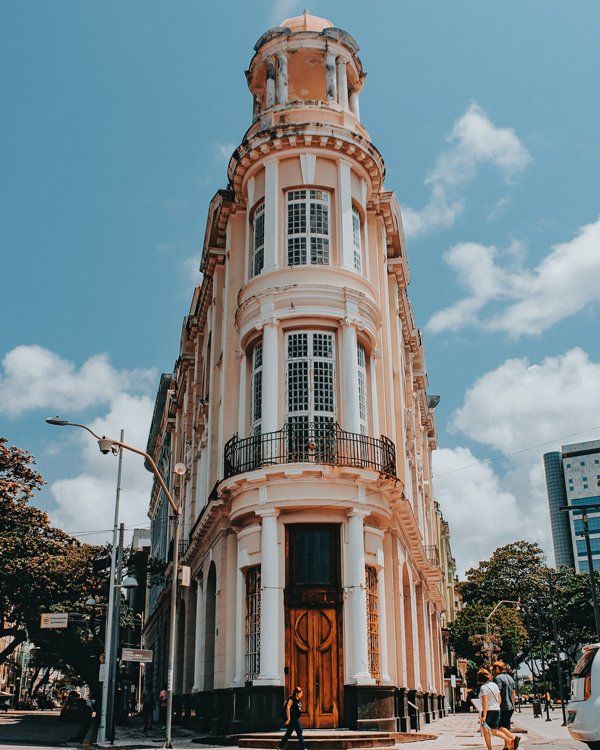 Centro Histórico, Recife A tall building with a balcony on the side of it