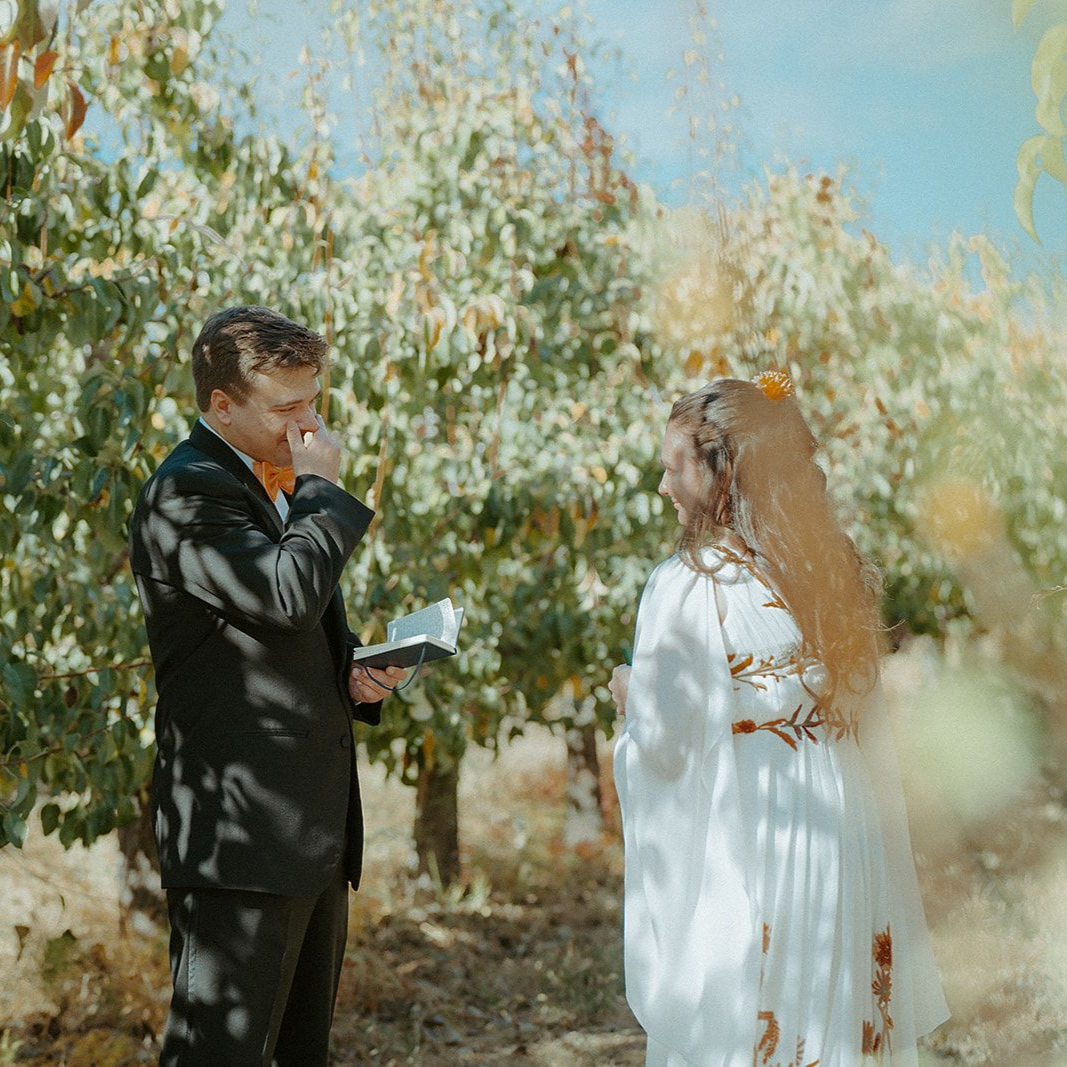 Bride and groom sharing an emotional first look captured by Milk & Peonies
wedding photographer in Southern Oregon
