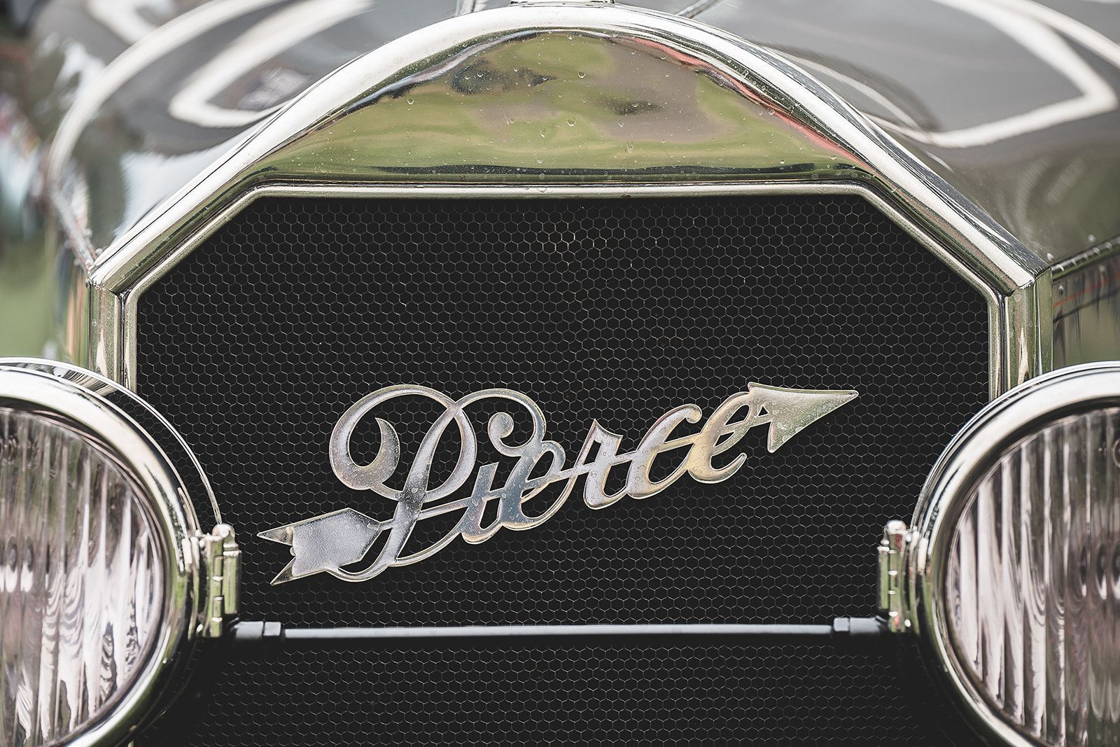 A black car with the word pierce on the front