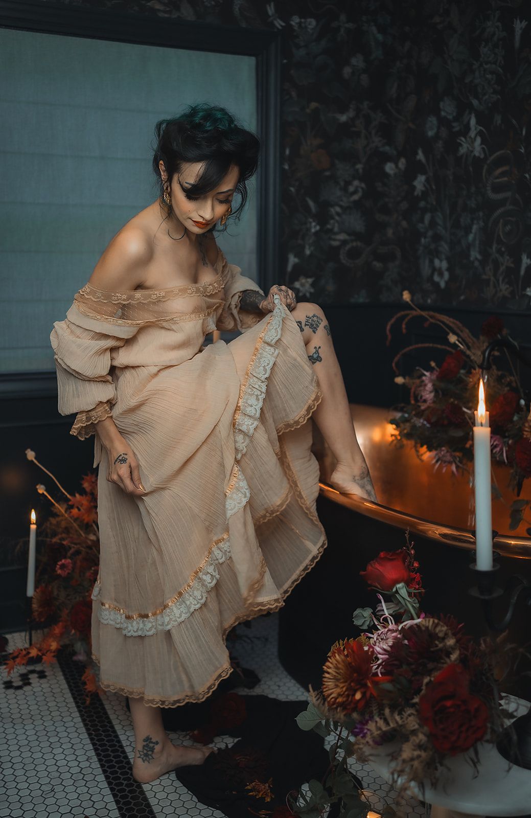 A woman in a dress is taking a bath in a bathtub.
