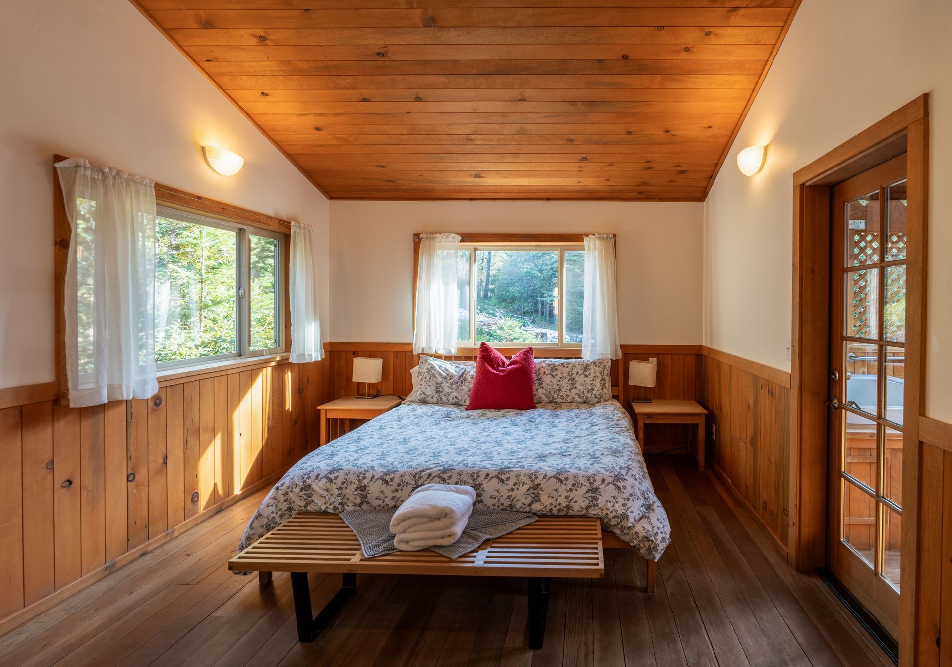 There is a large bed in the middle of the room.