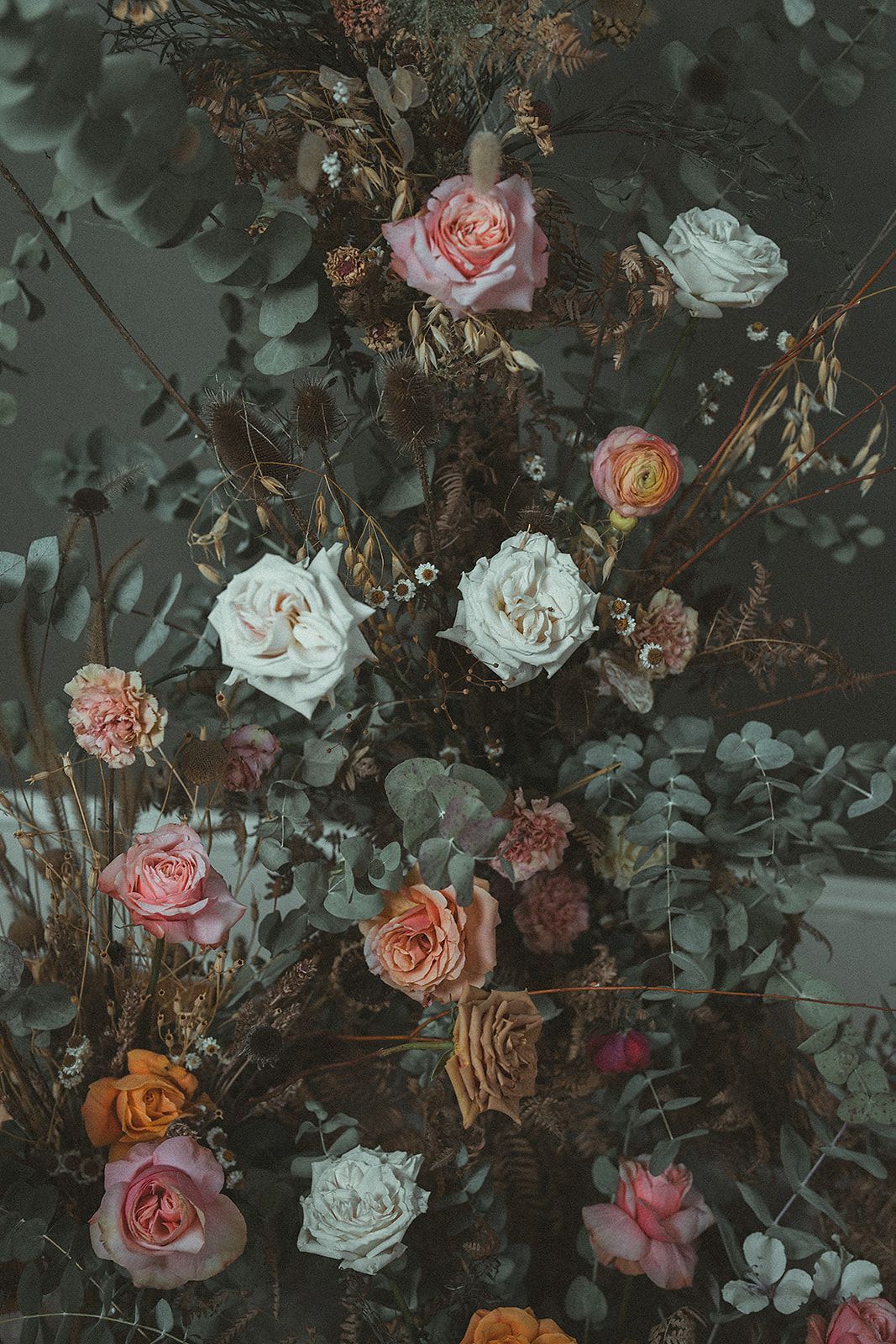 A bunch of flowers are floating in the water.