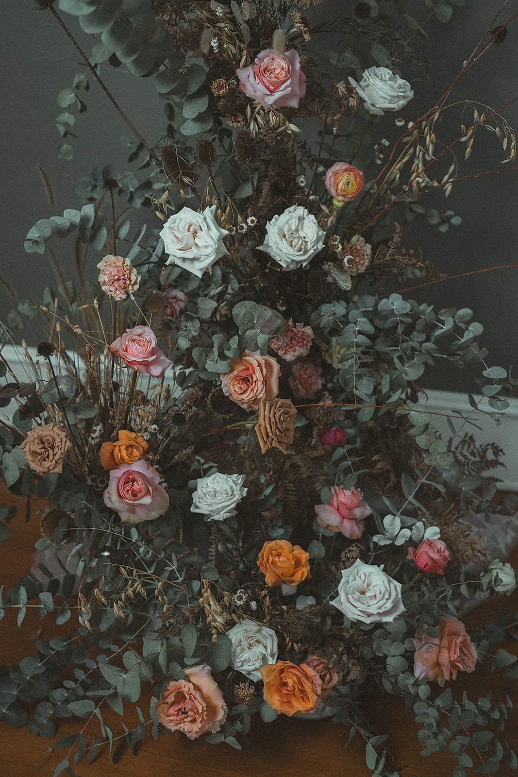A bunch of flowers are sitting on a table.