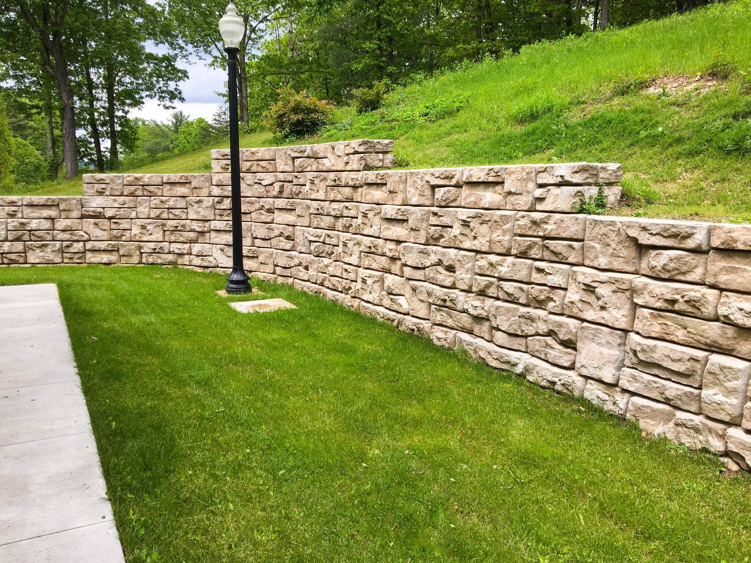 Redi-Rock vs. Versa-Lok Retaining Wall Installation