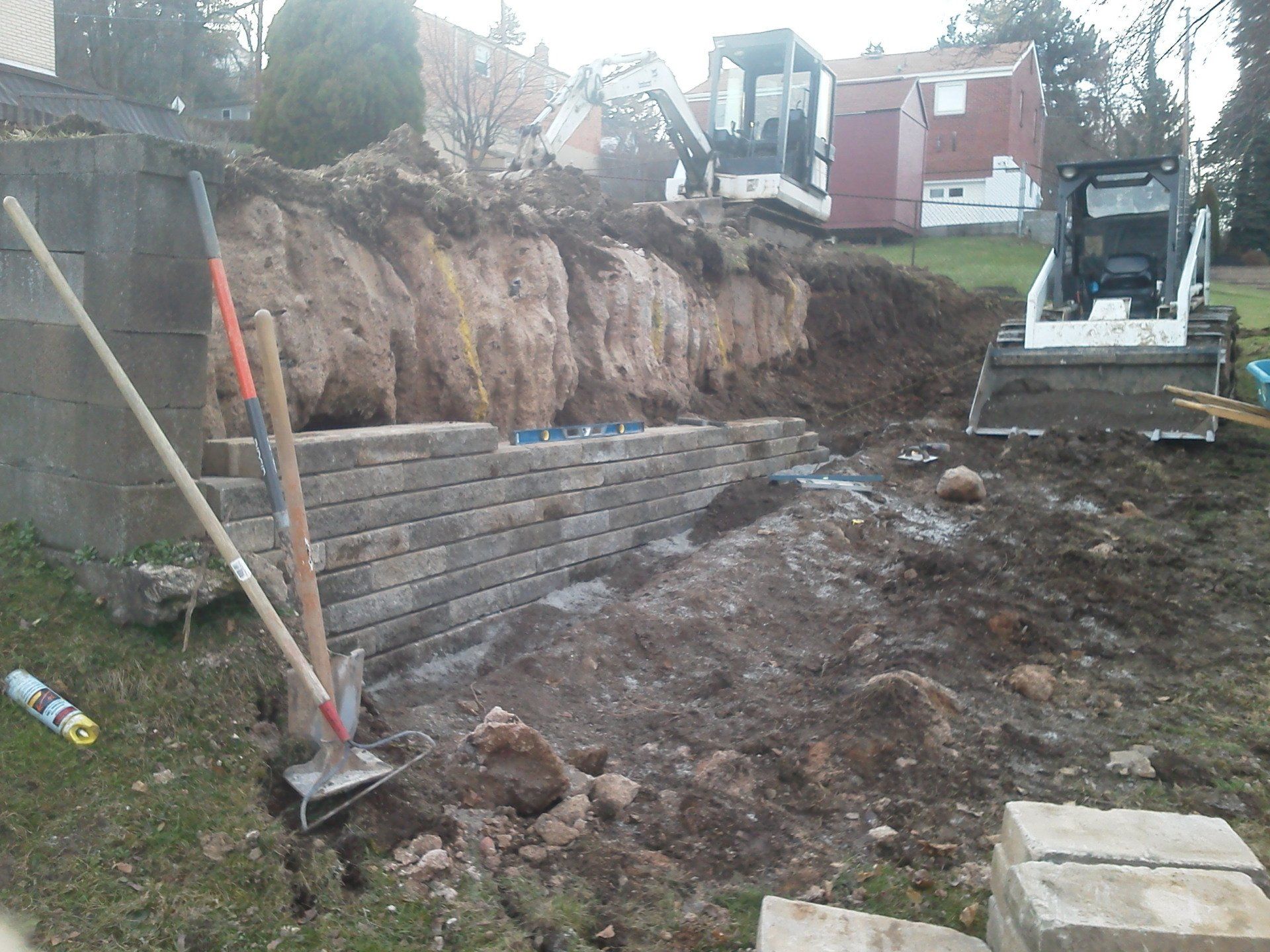 A construction site with a bulldozer in the background