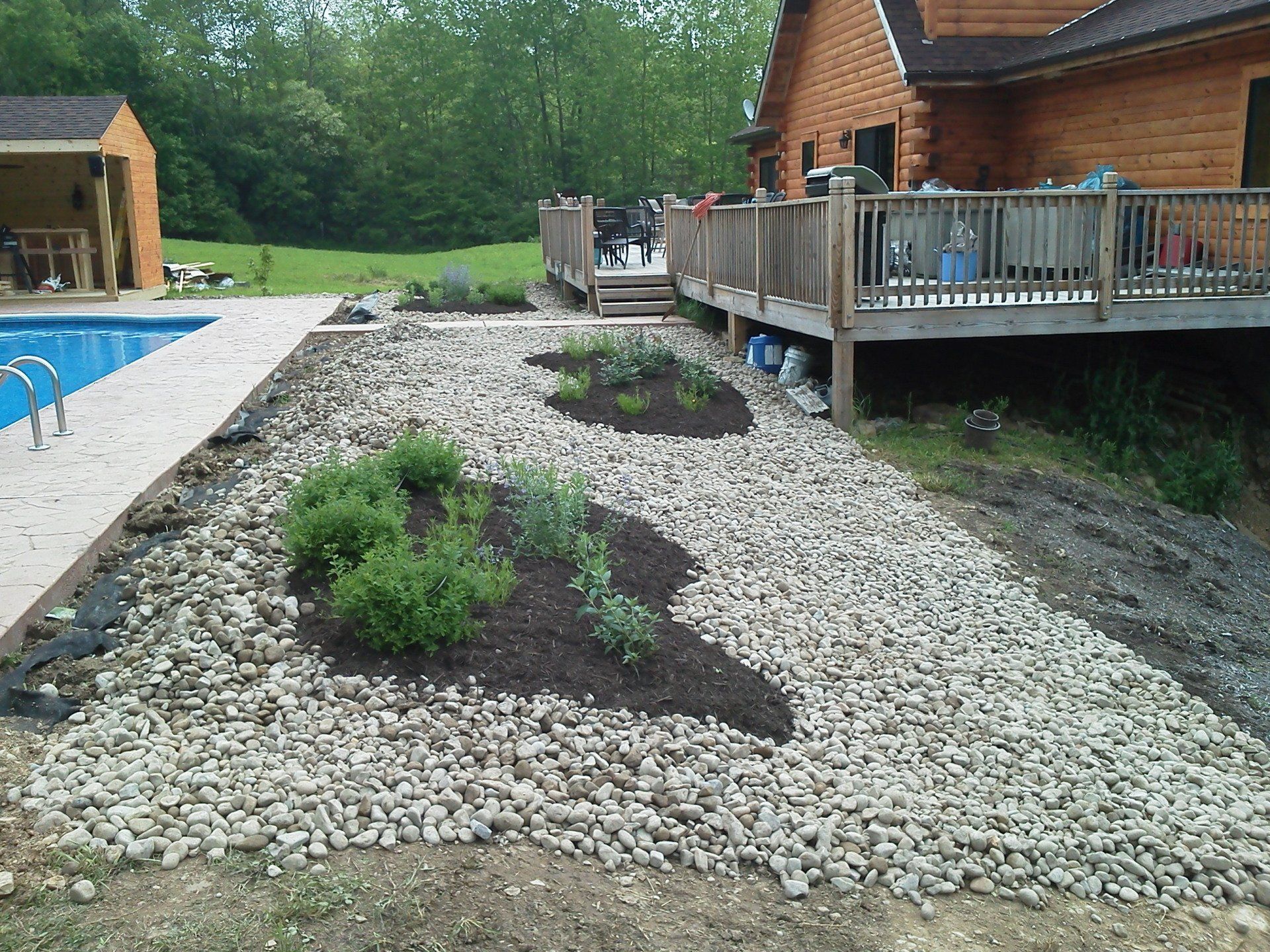 A house with a swimming pool and a deck
