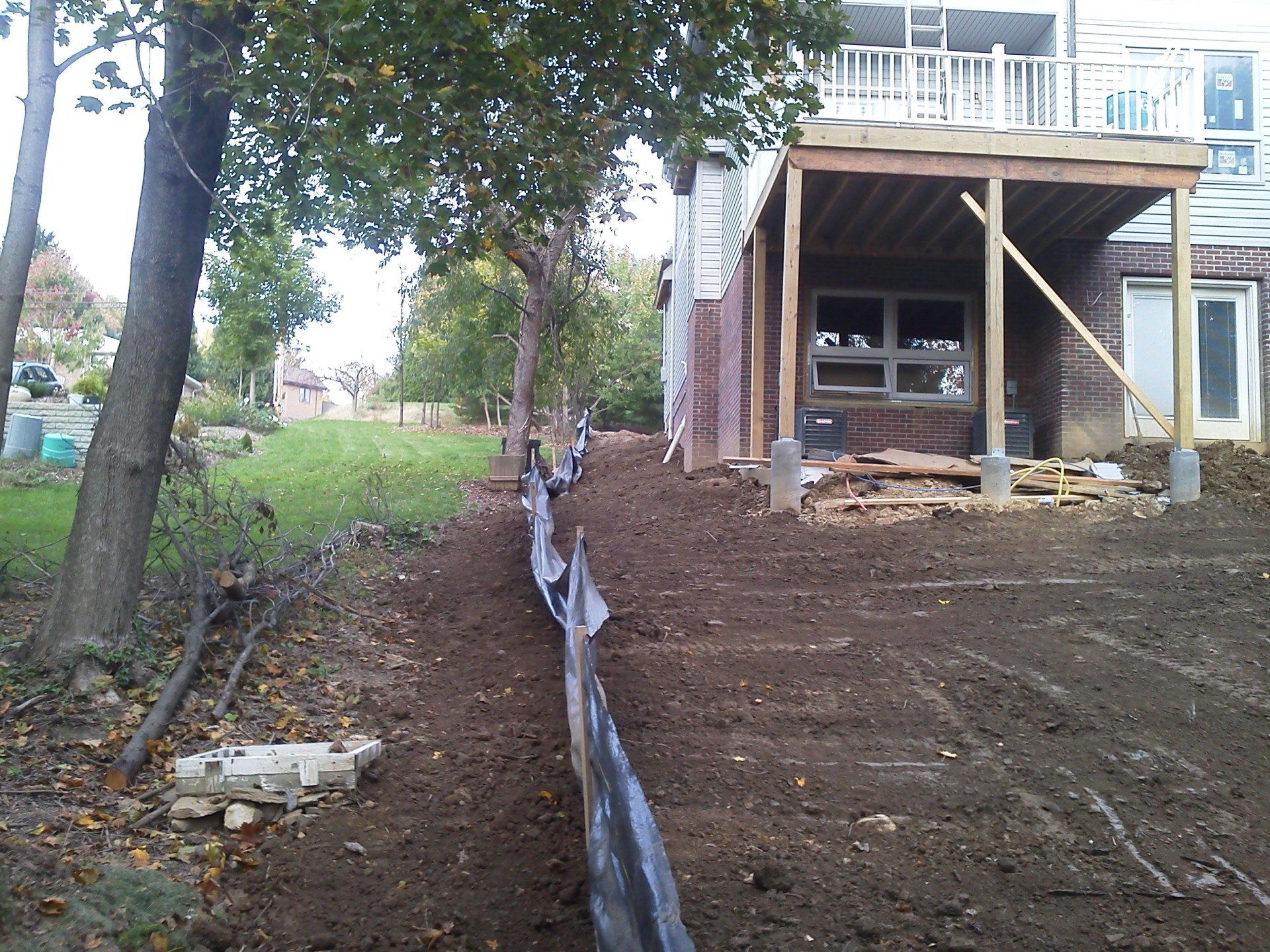 A house that is being built with a large deck