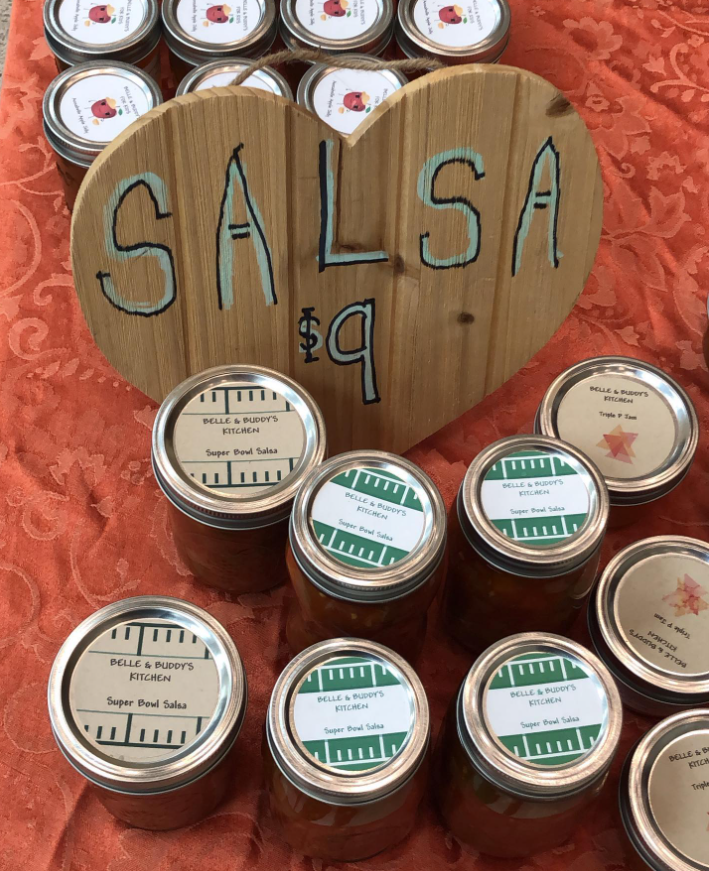 A wooden sign that says salsa on it