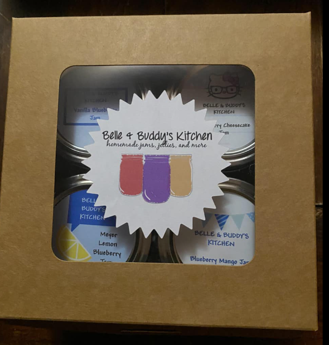 A box of belle 4 buddy 's kitchen jars