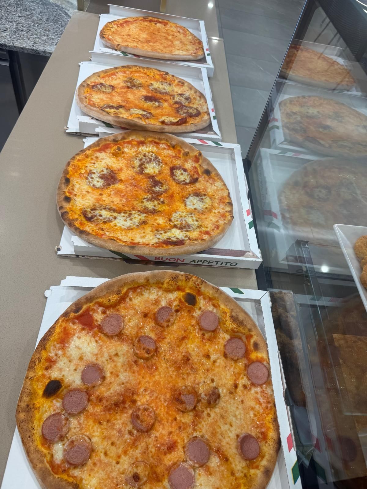 K2 Since 1983 KEBAB e PIZZA TACOS CHICKEN