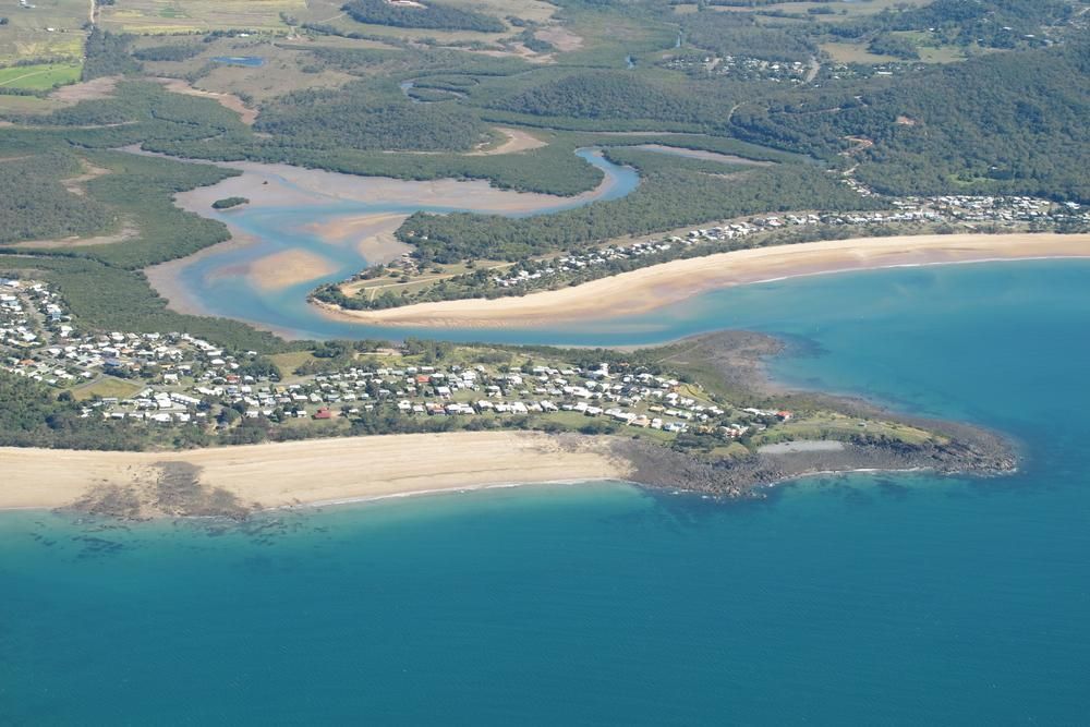 Aerial View of a Beach and a River in the Middle of the Ocean — G & A Glass & Aluminium in Mackay, QLD