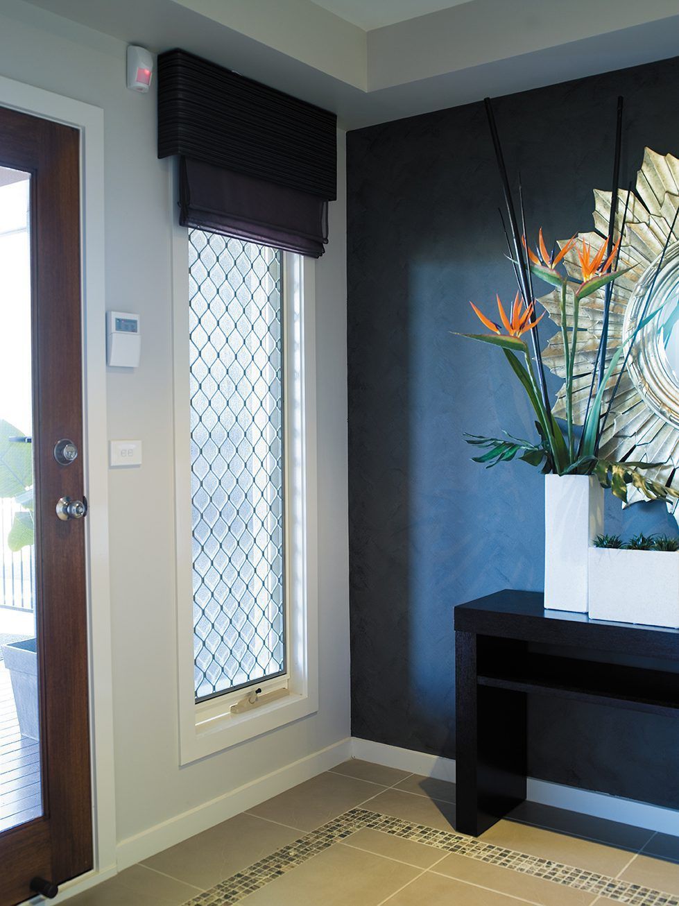 Aluminium Door and Black Mesh Door Design — G & A Glass & Aluminium in Cluden, QLD