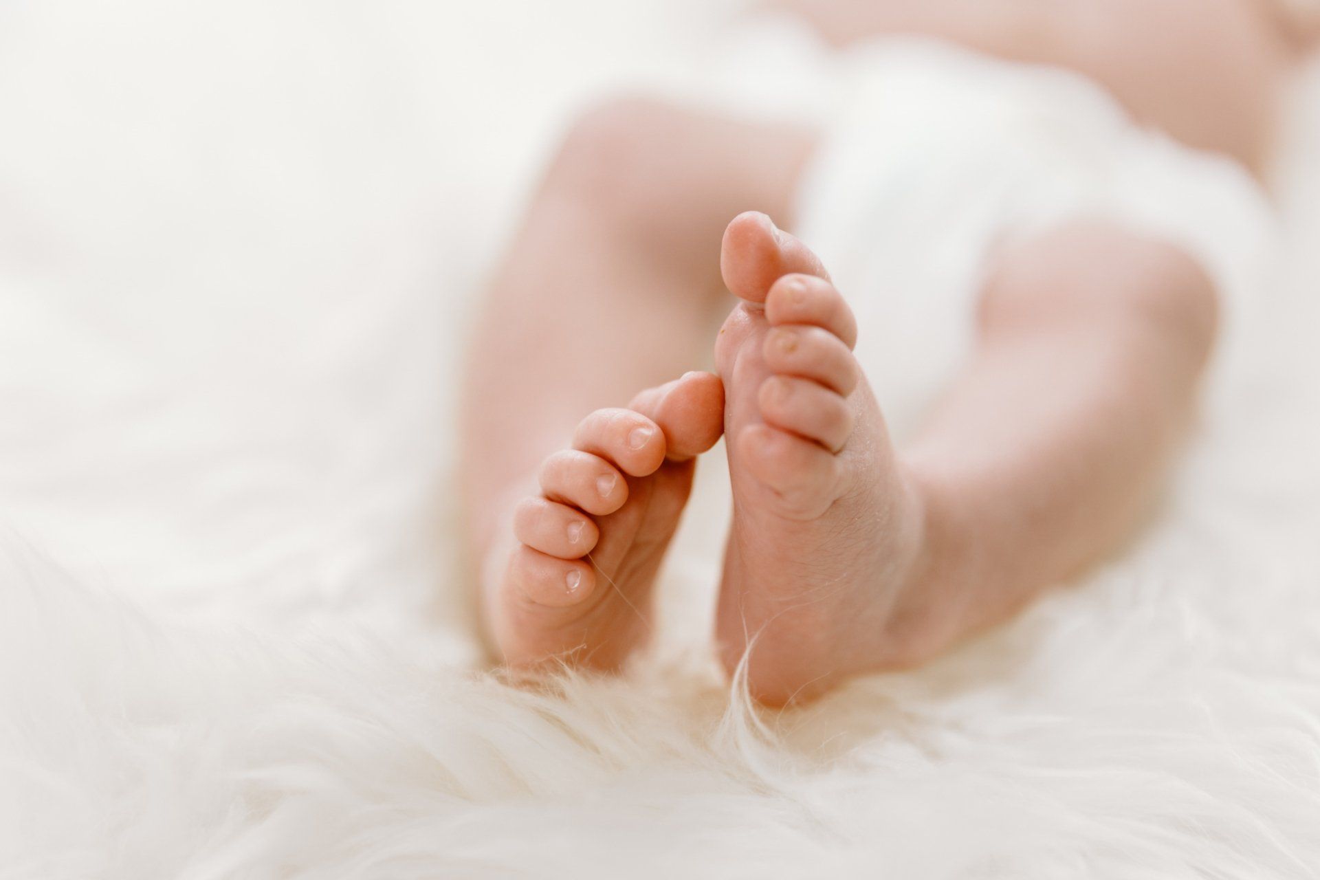 Closeup of newborn baby's feet
