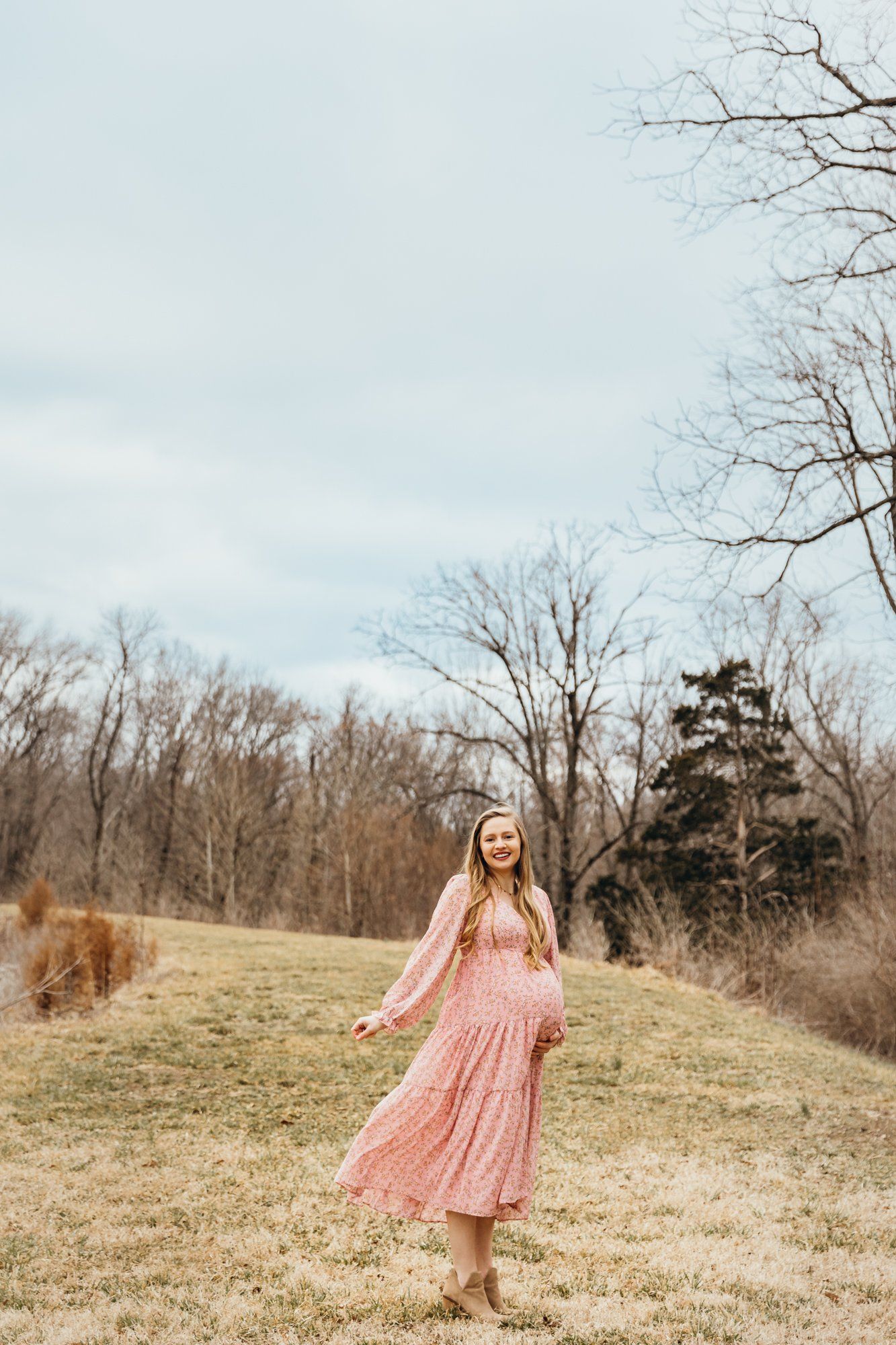 Mom holds her baby bump