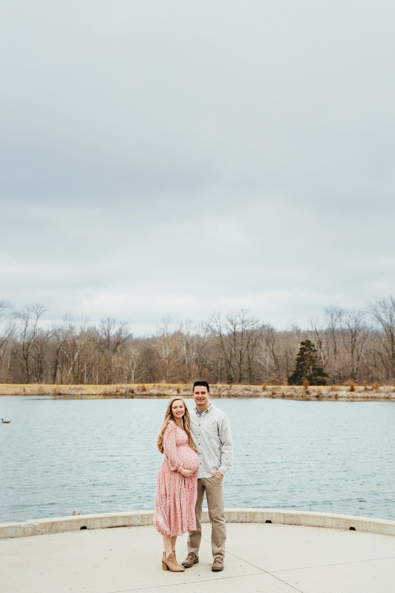 Soon to be parents hug each other