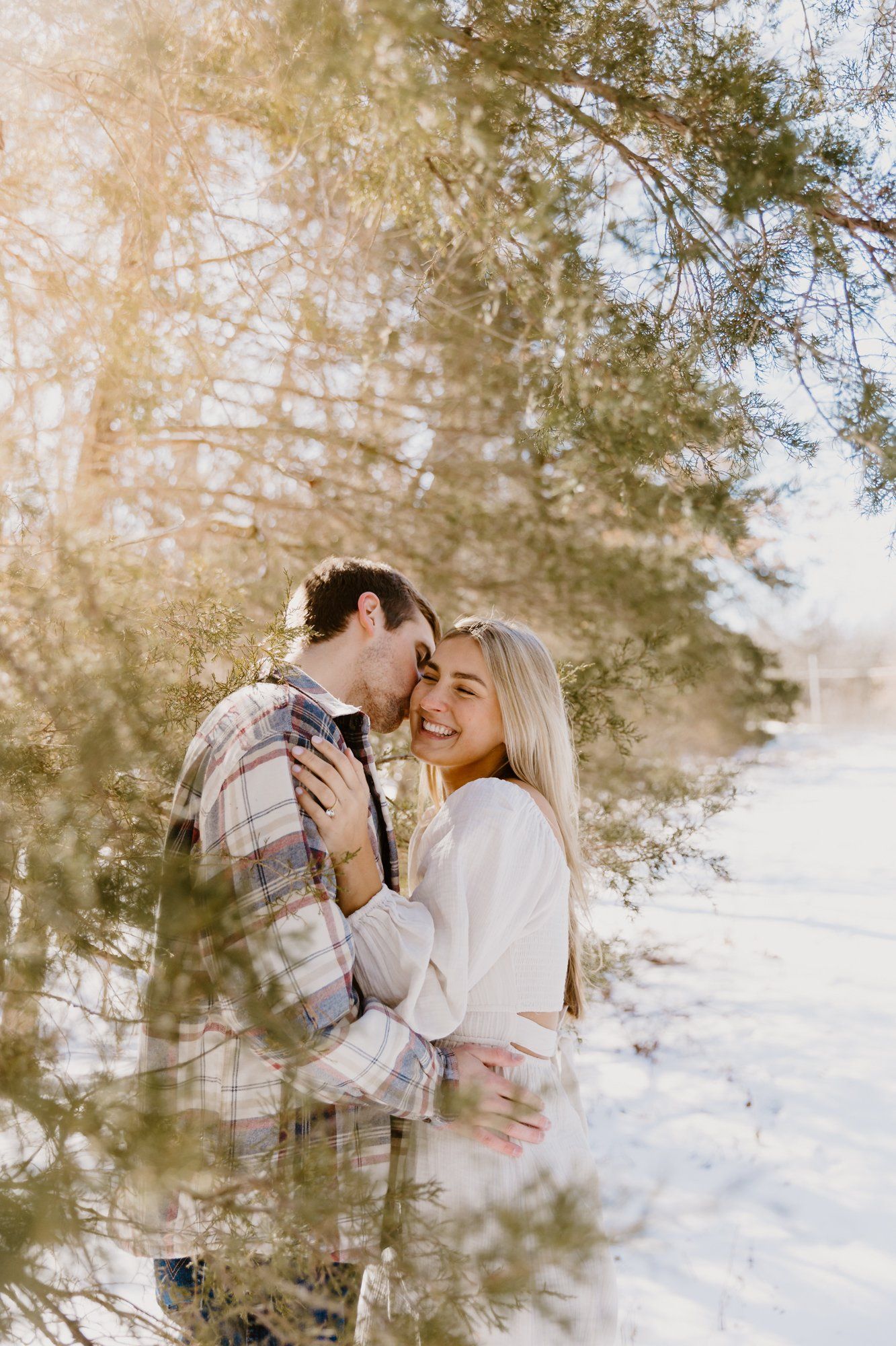 Man kisses his fiance in Columbia, MO