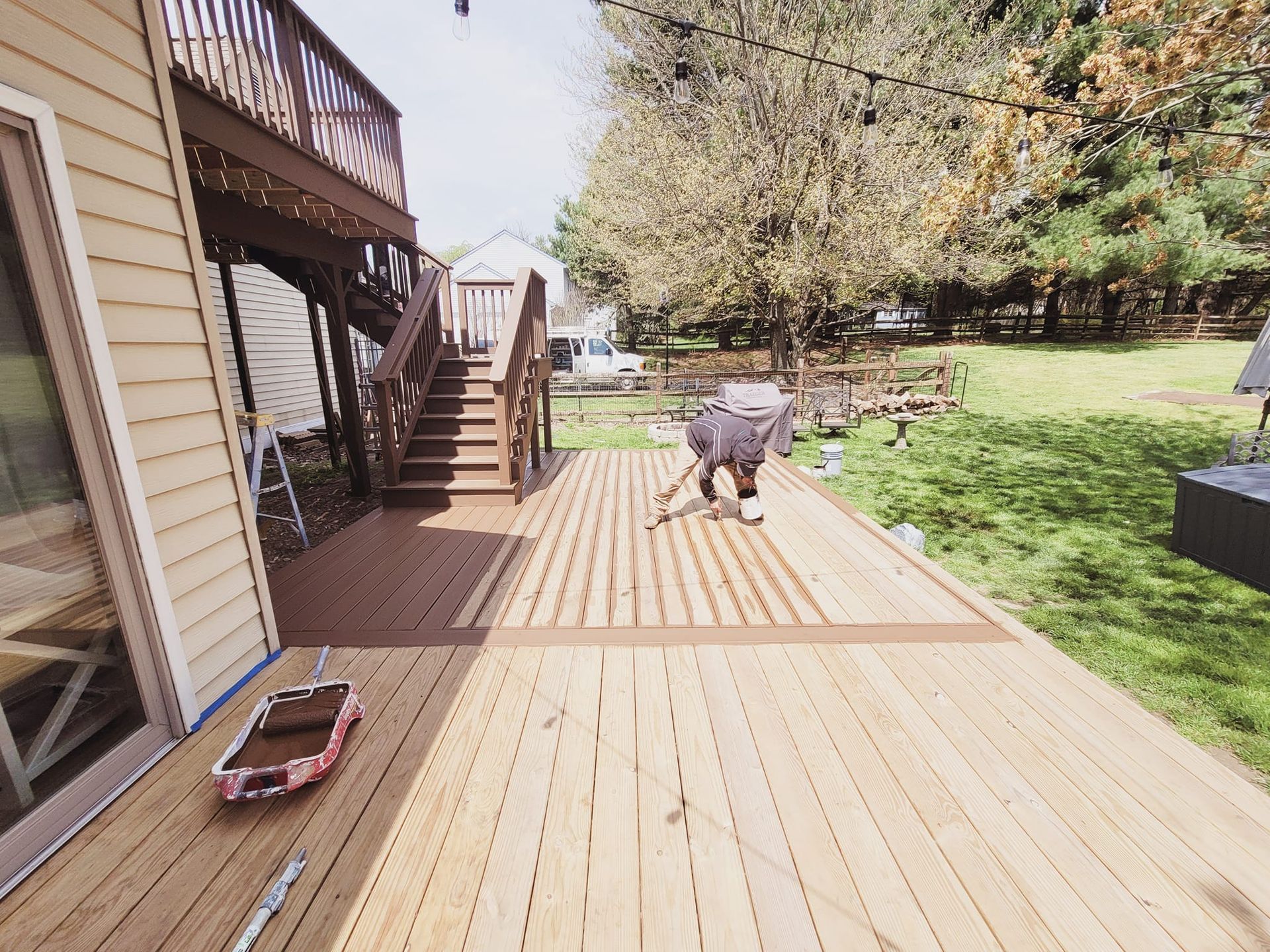 Worker Painting Wooden Deck — West Grove, PA — CRV Painting