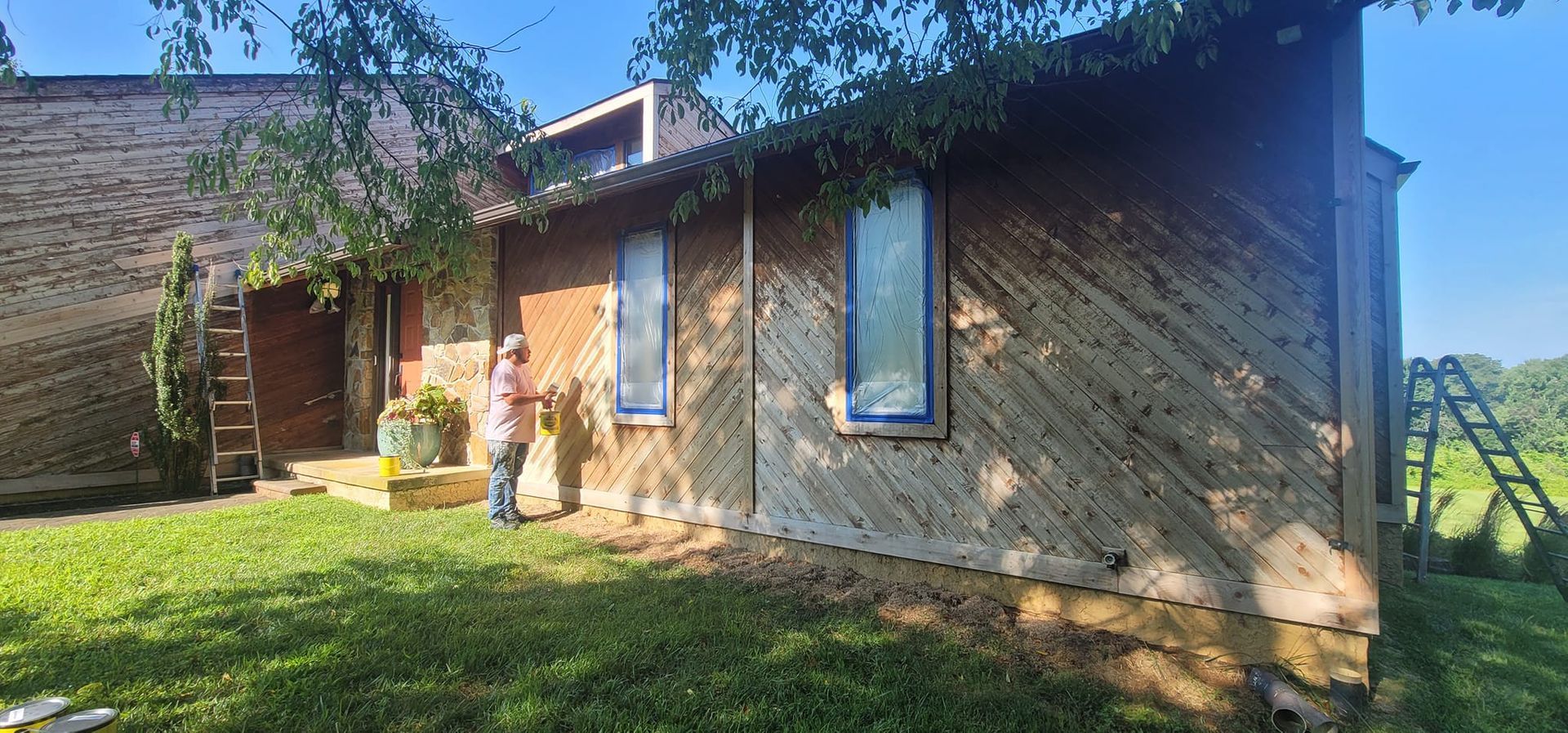 Worker Painting House Siding — West Grove, PA — CRV Painting