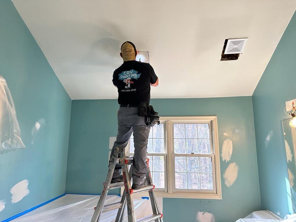 Worker Repairing Ceiling — West Grove, PA — CRV Painting