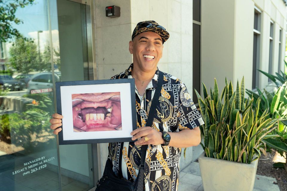 Dental Patient Smiling With His New Dental Implant Smile