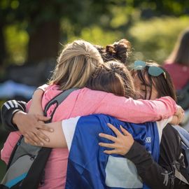 Two CF community members embracing after the fundraising Walk